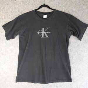 Vintage 90s Calvin Klein Jeans T Shirt Mens L Black Faded CK Logo Tee Grunge